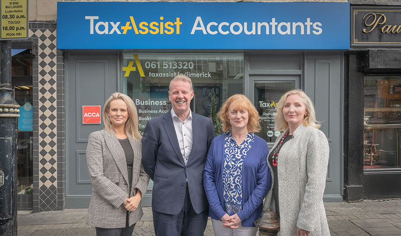 TaxAssist Accountants franchisee infront of their shop